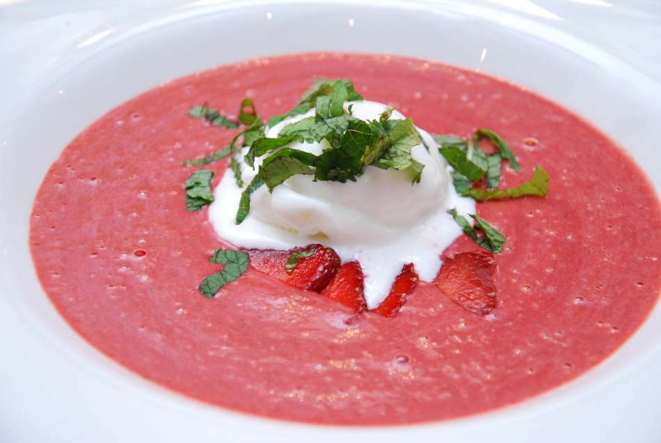 Strawberry soup with ice cream.