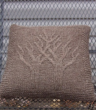 A pillow with trees