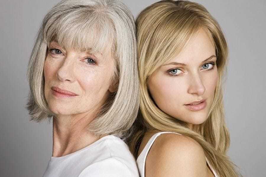 Two women of different ages - one gray -haired, the second is a golden blonde