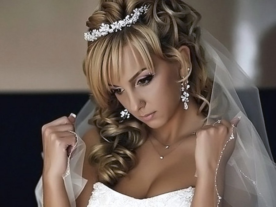 Original hairstyle for a bride with a bang
