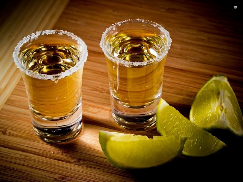 A way to drink tequila with lemon and salt