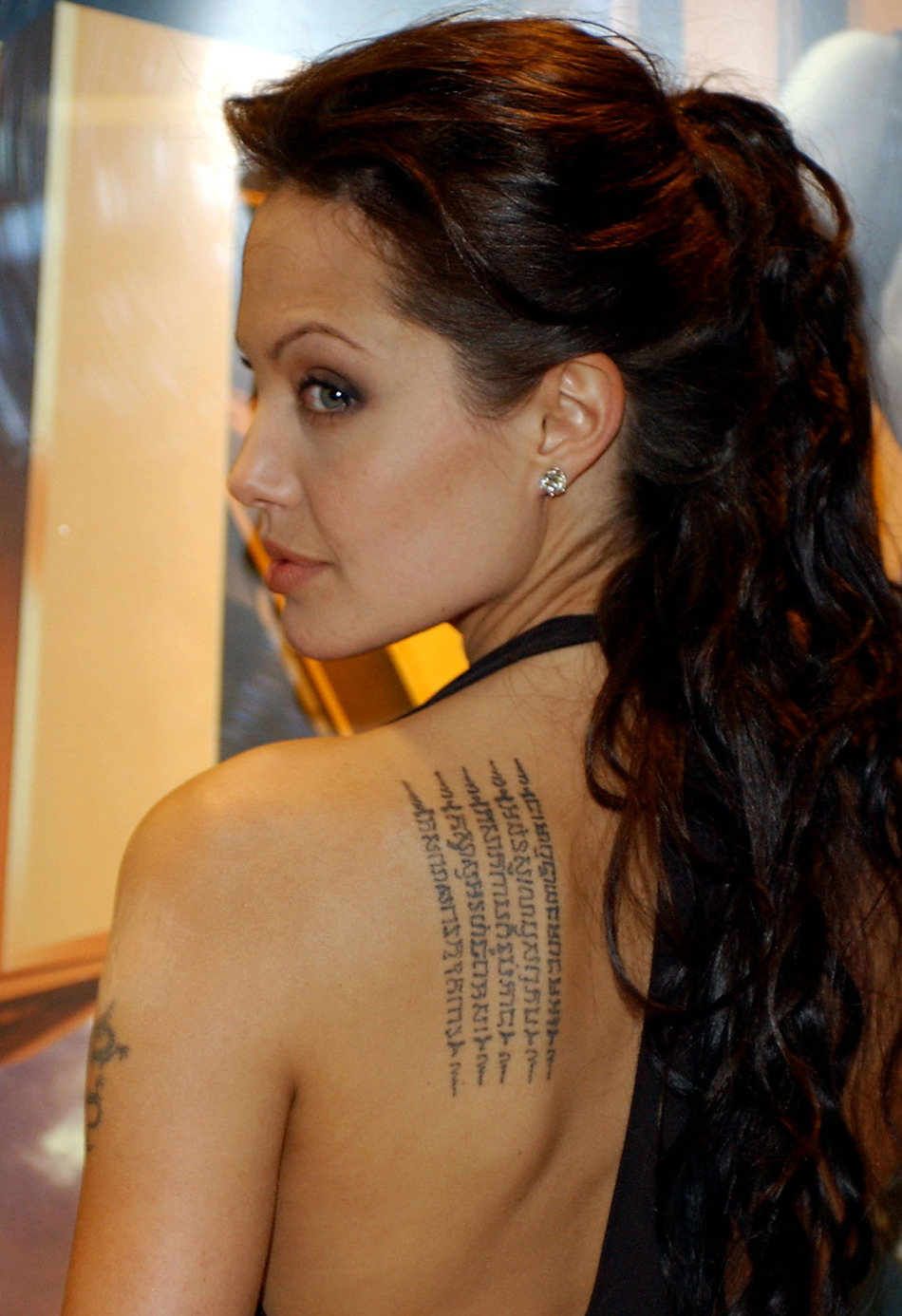 Khimer-tattoo inscription on the back of Angelina Jolie