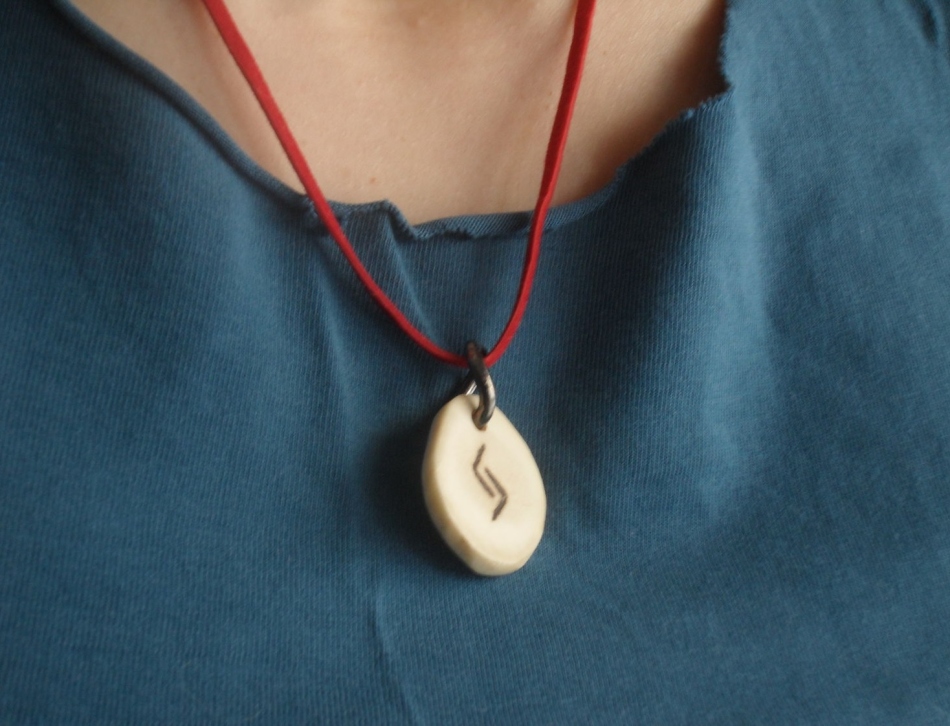 Runa for good luck can be worn in the form of a medallion
