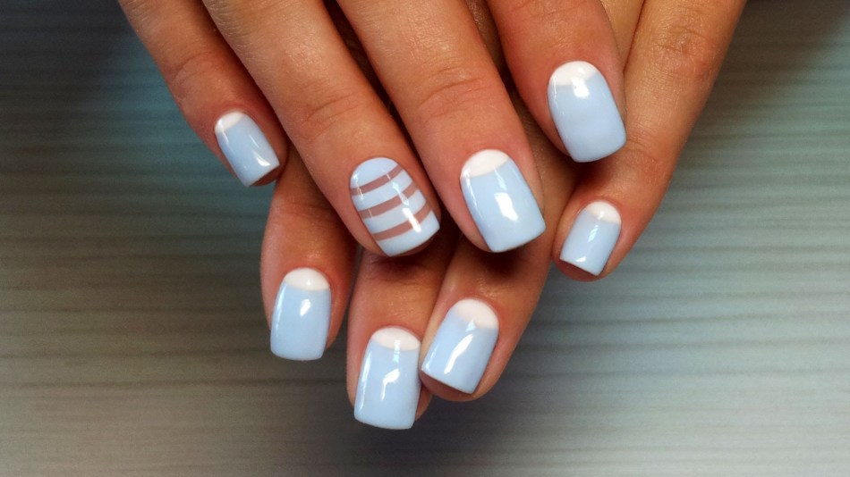 Delicate white and blue manicure