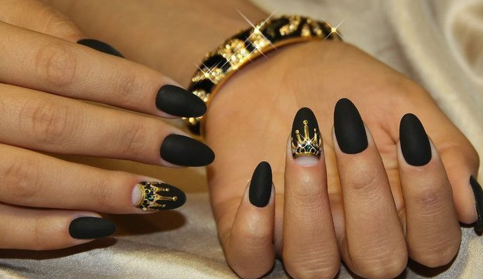 Matte black manicure with crown
