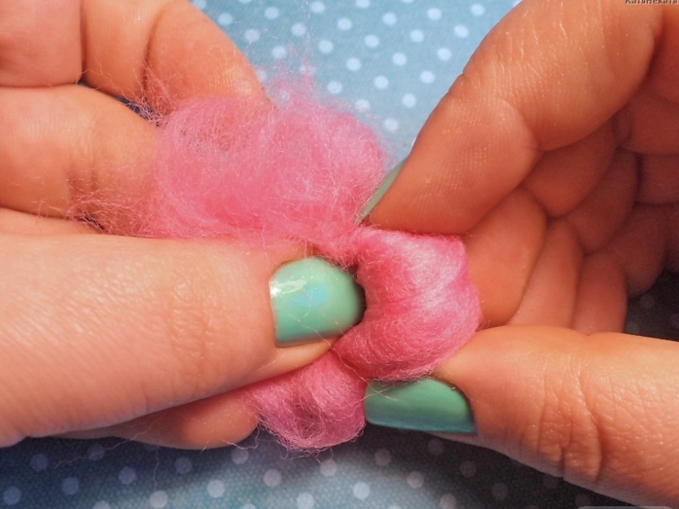 Felting wool is twisted into the ball