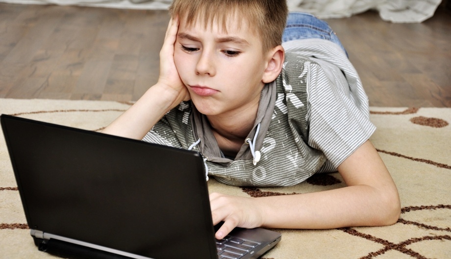 A child near a computer