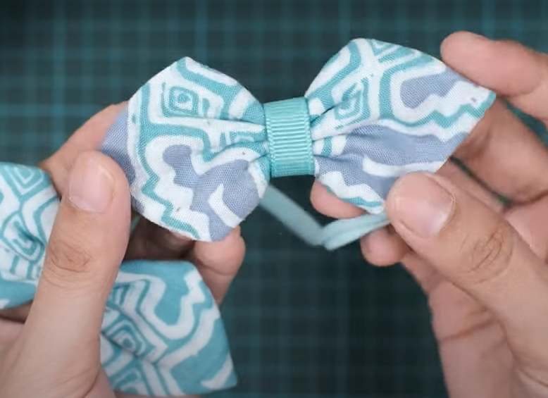 Cara menjahit busur kain yang indah