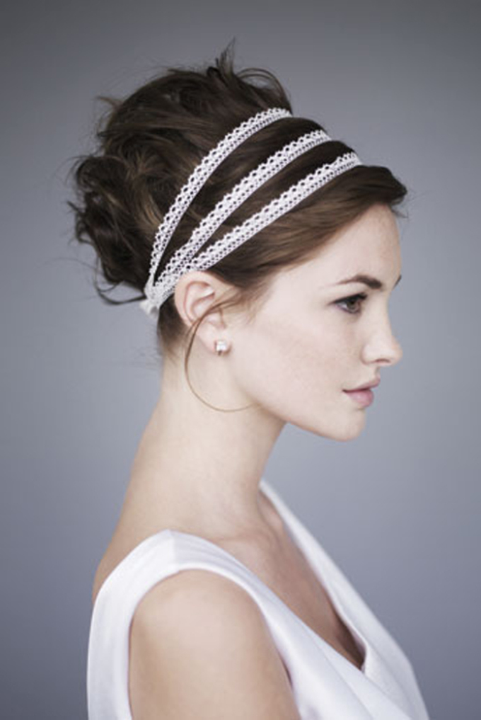 Evening bun for short hair can be decorated with an elegant accessory