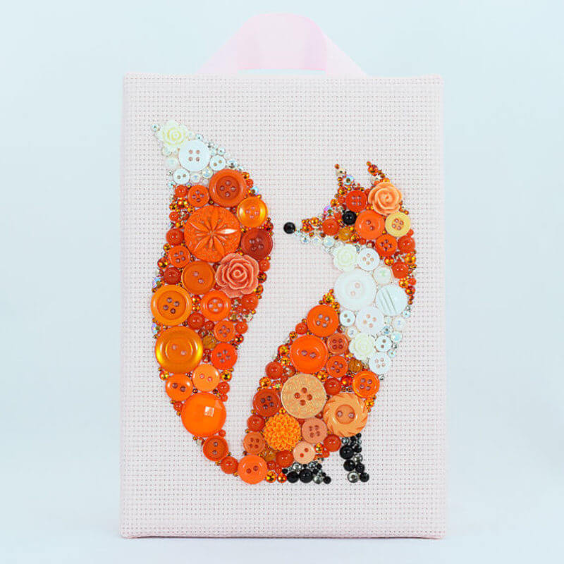 A pretty fox of buttons will decorate any panic -sympathetic fox from buttons to decorate any panel