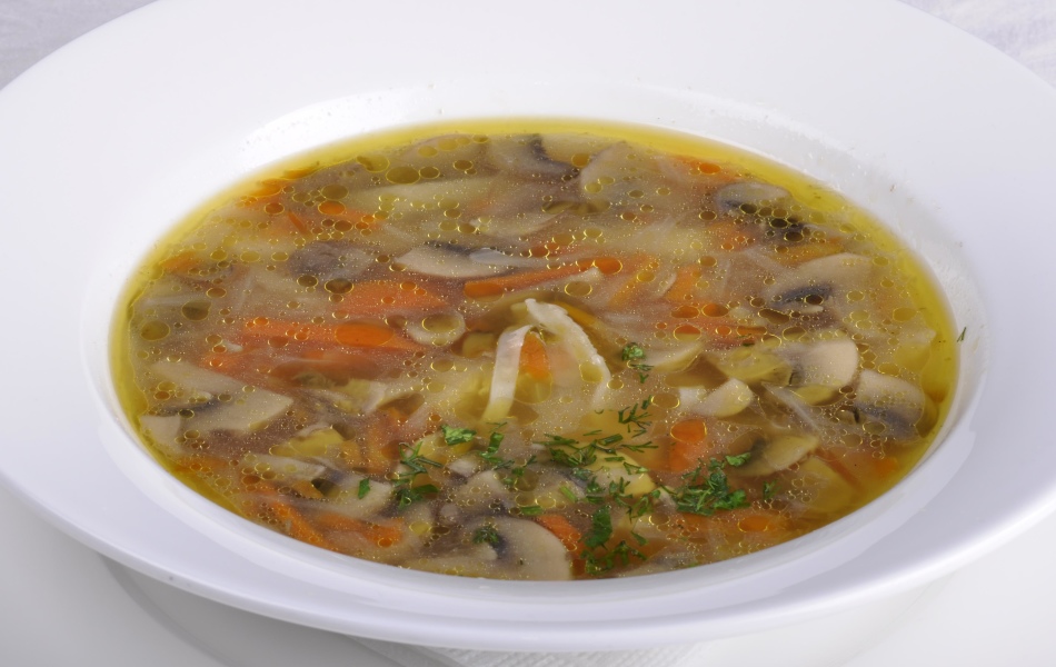 Chicken soup with champignons.