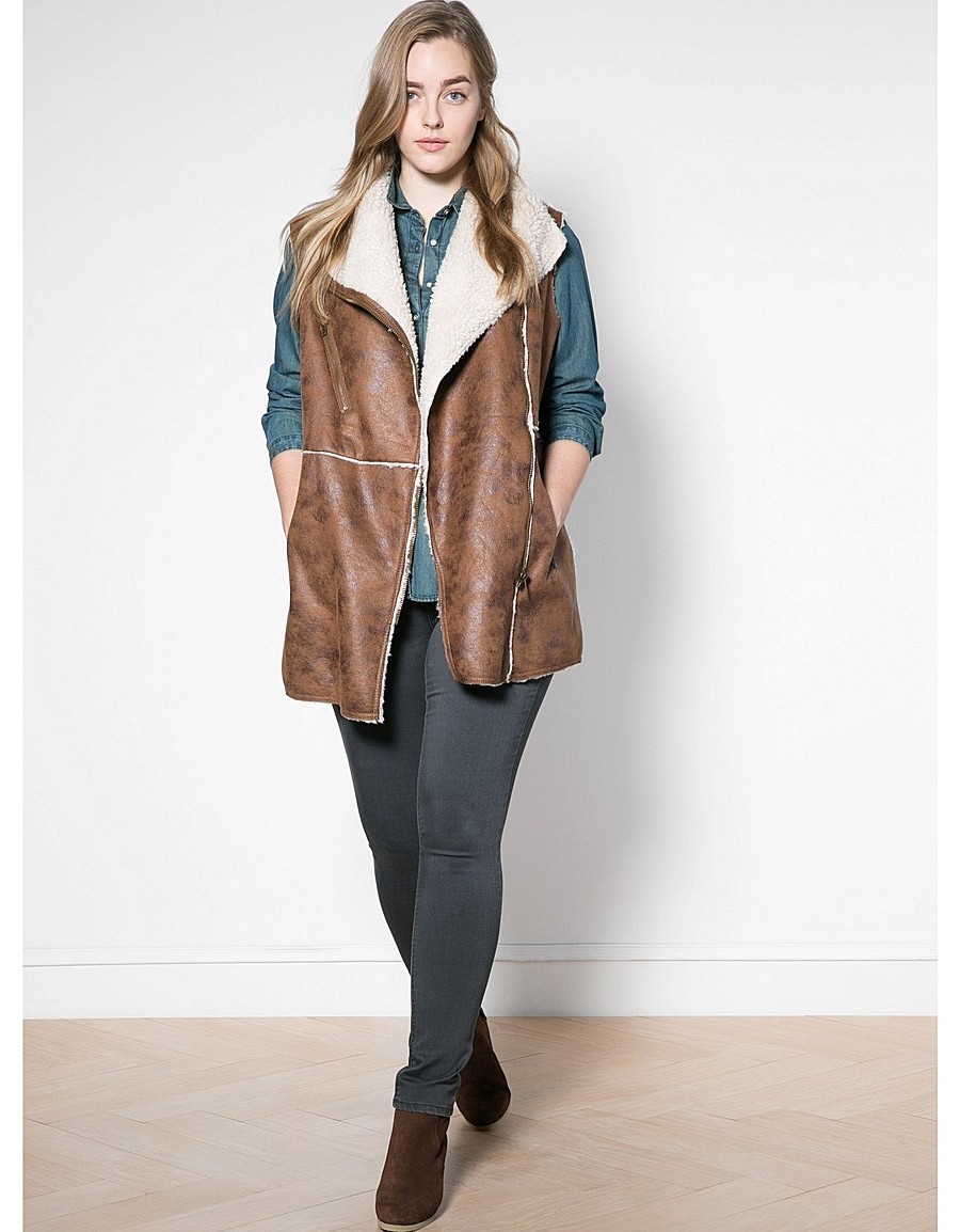 Hogyan lehet varrni egy mellényt saját kezével egy régi juhbőr kabátból: női modellek