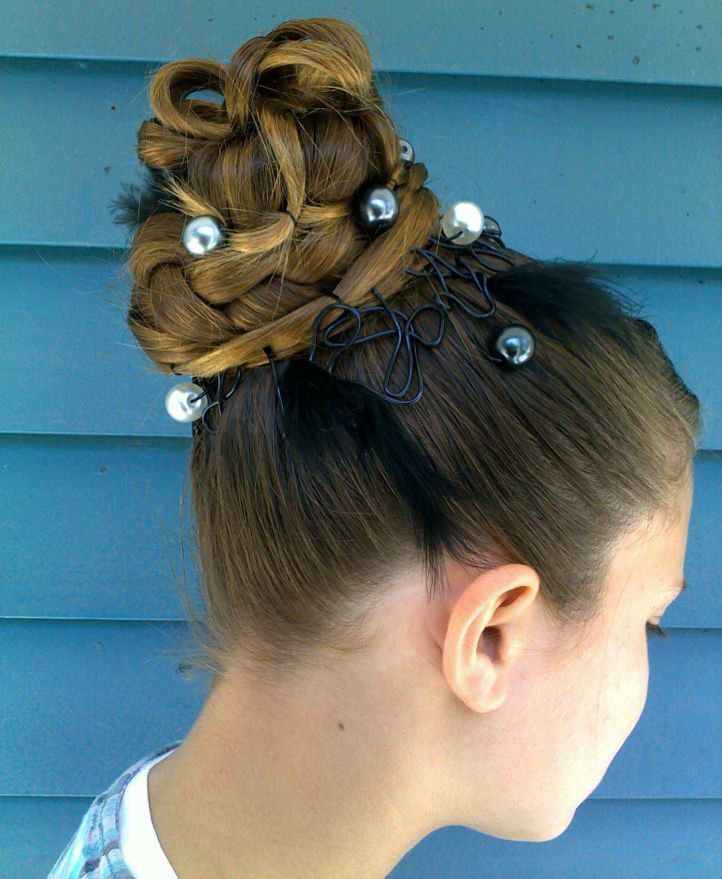 The French braid can be laid in such a high bundle, beautifully decorating it