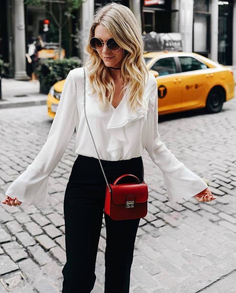 You can revive white-black classics with a bright note in the form of a red bag