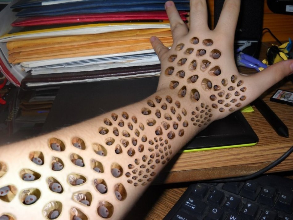 Decorative holes on the skin causing tripophobia