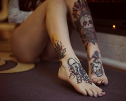 Tattoos for girls on the legs are small and large and their meaning: on the thigh, ankle, foot, front side of the thigh, lower leg, ankle. Ideas for tattoos for girls on the legs: drawings, sketches