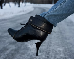 Was bedeutet es, wenn Schuhe zerrissen sind, Kleidung oder eine Ferse auf einem Friedhof gebrochen sind: ein Schild