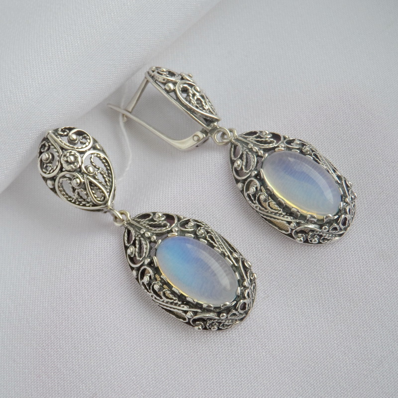 Vintage silver earrings with a lunar stone for spring-2023