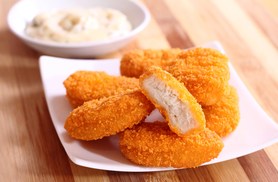 Nuggets gyllene orange färg ger kryddor och olja för att steka god kvalitet