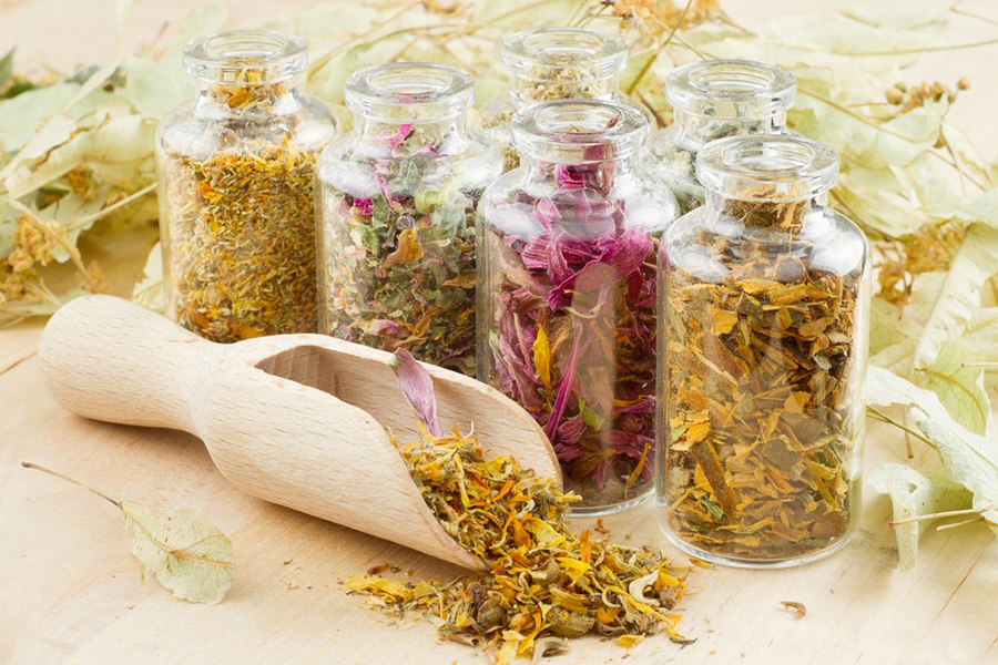 Dry herbs in glass jars for use during pregnancy