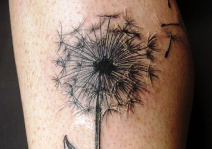 Tattoo a whole dandelion flower