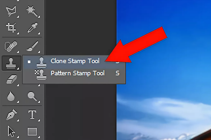 Выберите функцию clone stamp на панели инструментов