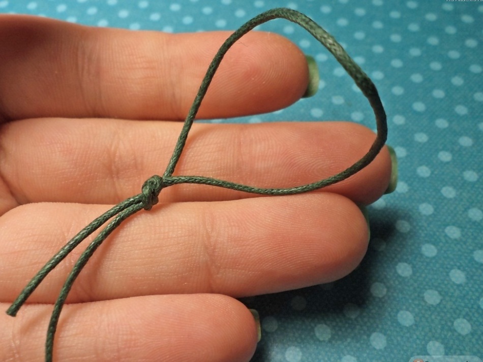 Felting cord is tied with a loop