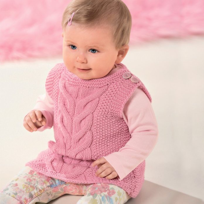 Pink vest for a girl knitting