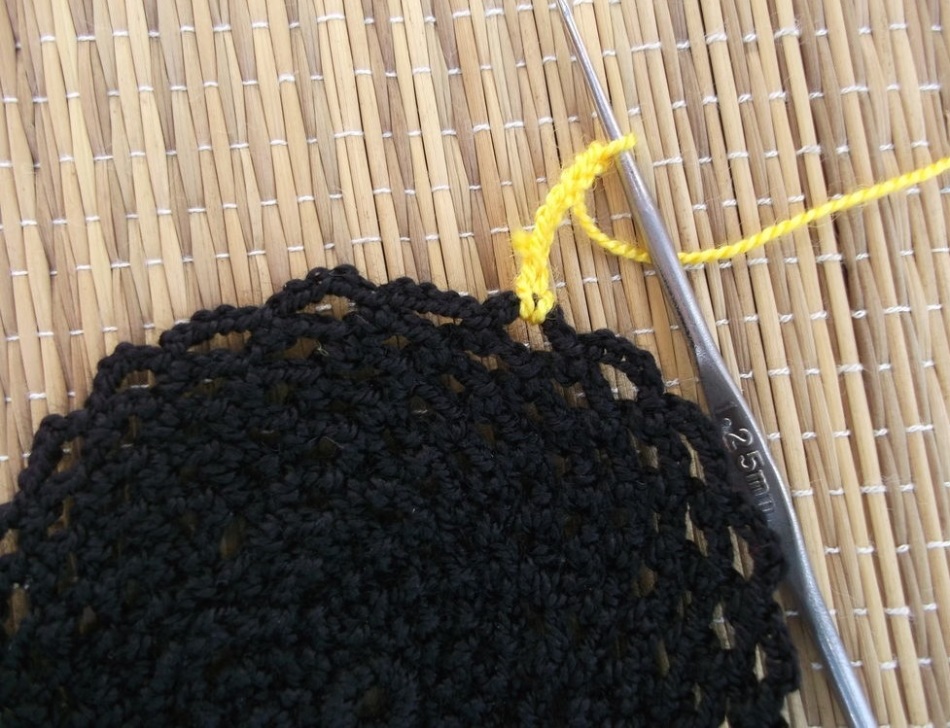 The beginning of the formation of yellow petals of sunflower stands for dishes