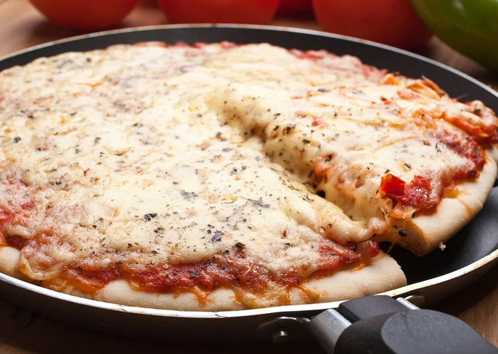 Pizza in a pan in a purchased mayonnaise
