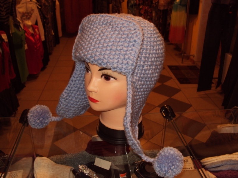 A cap with pompons
