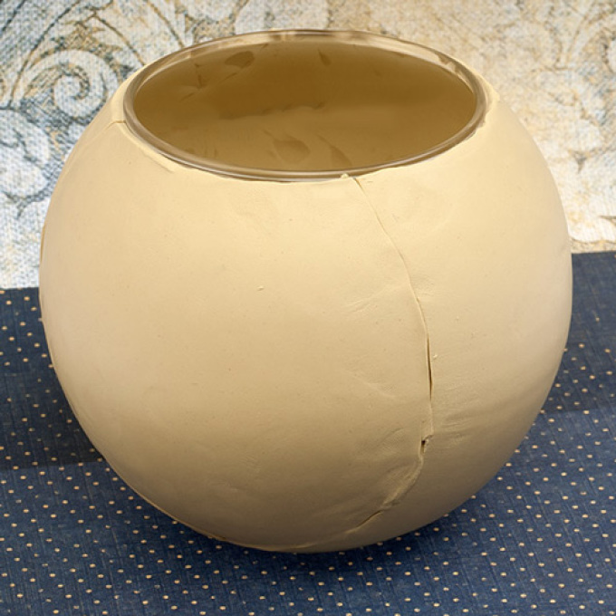 Wrap the vase with clay