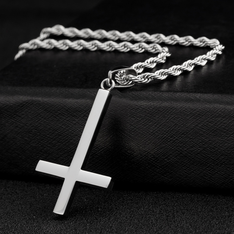 The pendant is an inverted cross.
