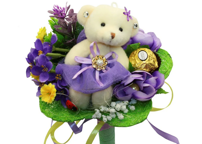 Bouquet of fresh flowers with sweets and 1 toy