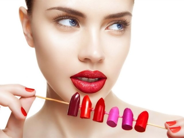 The character of a girl or woman in lipstick