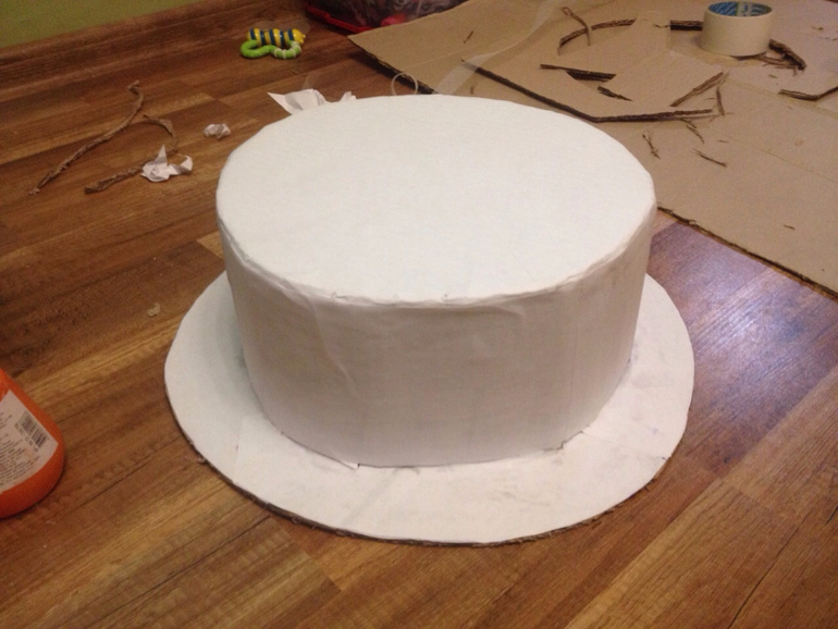 A stand for the first tier of the cake.