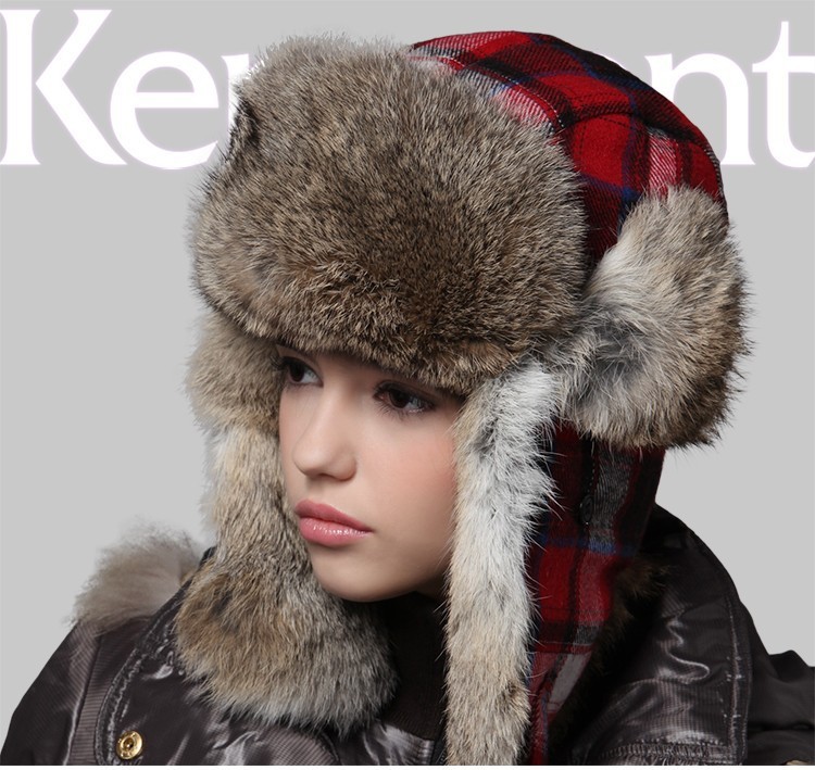 Hat earflap with natural fur.