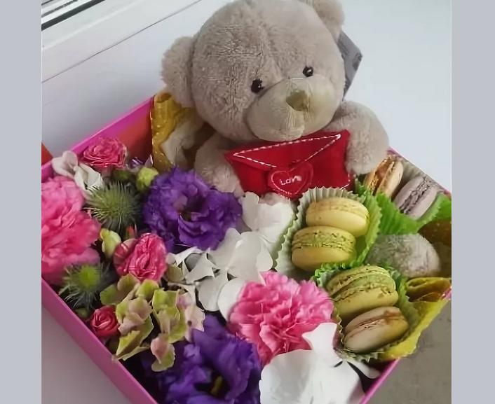 Bouquet of fresh flowers with sweets and 1 toy