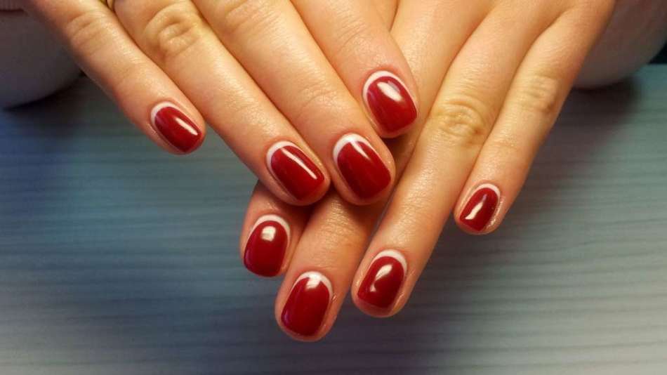 Red manicure on extended nails