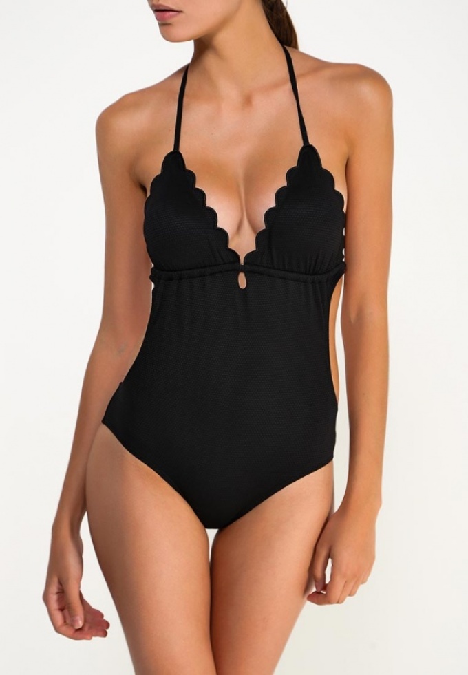 Closed black swimsuit with a flirty bodice from Topshop
